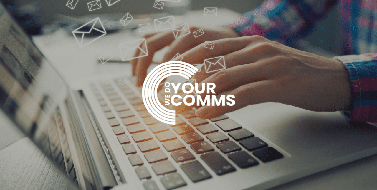 WeoYourComms white logo on background with man typing on Mac laptop