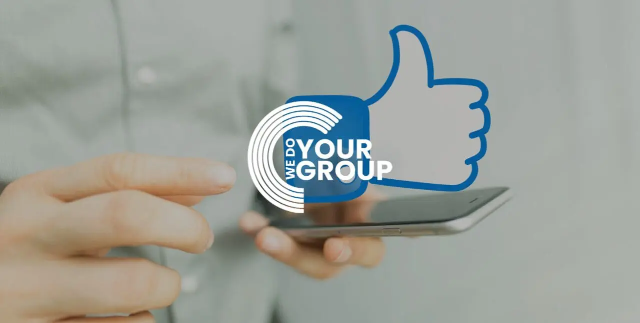 WeDoYourGroup white logo on background with mobile phone with digital facebook thumbs up logo