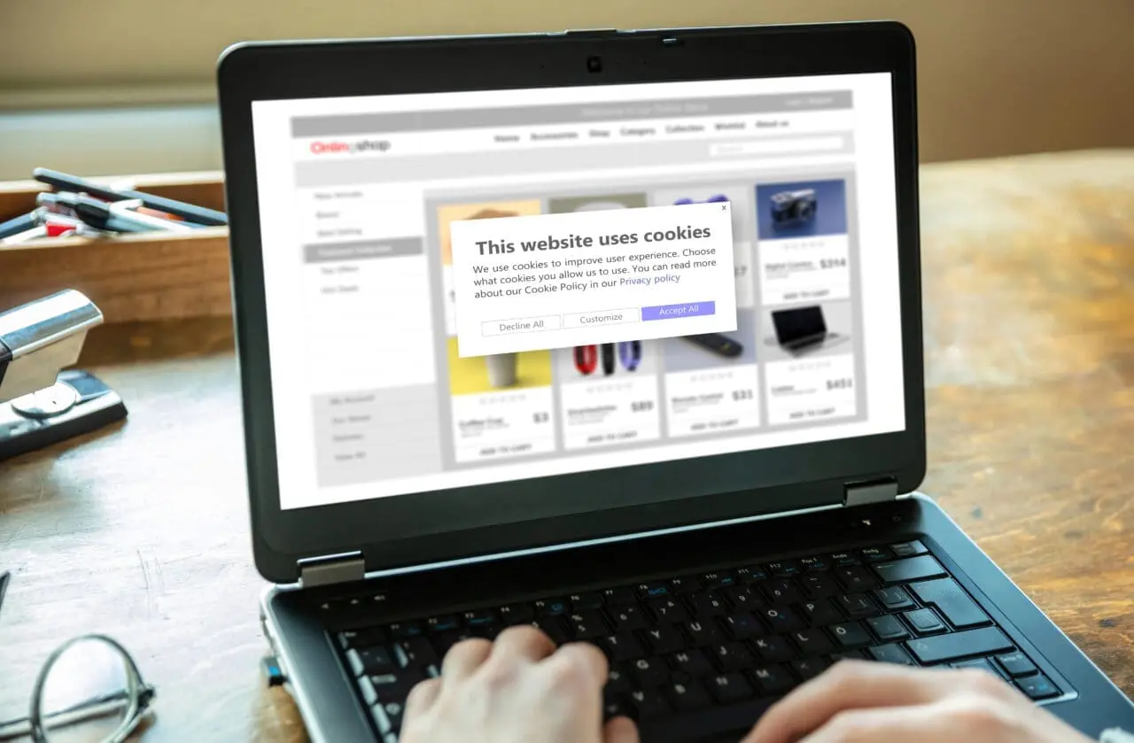 Cookie policy information message on a tablet screen.