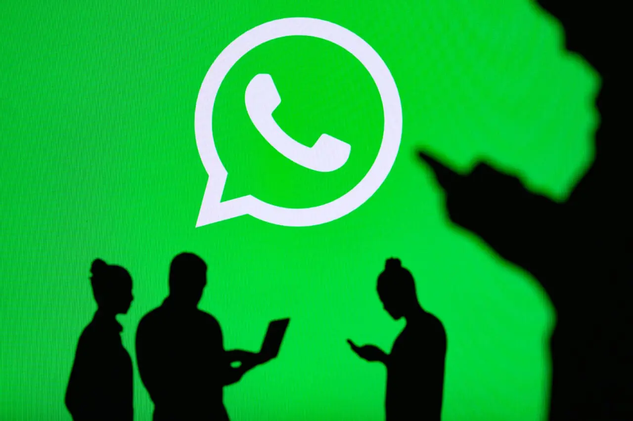 WhatsApp Company logo on screen in background