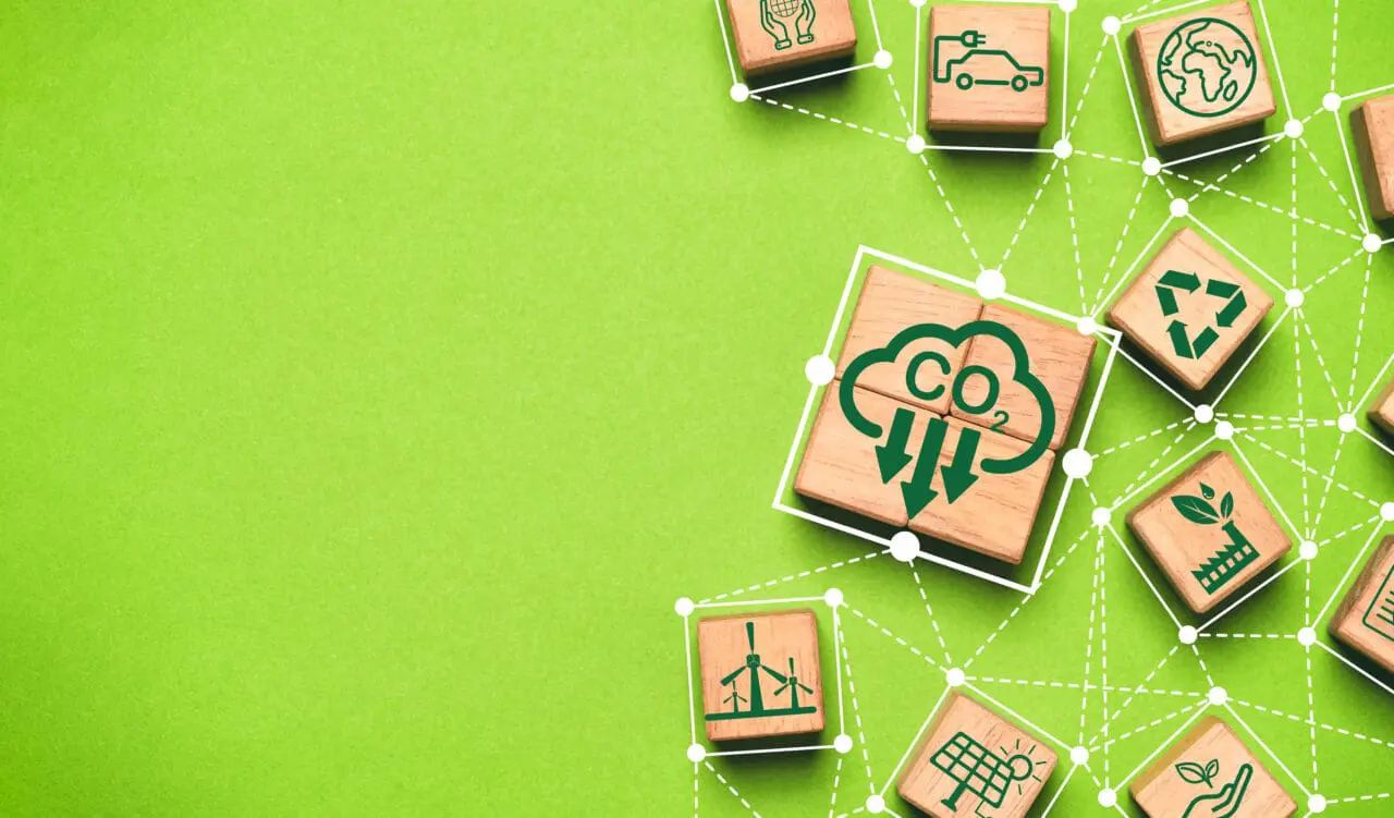 CO2 reduction on green background linkage with environment icon for decrease CO2 , carbon footprint and carbon credit to limit global warming from climate change in Kyoto Protocol 2050 concept.
