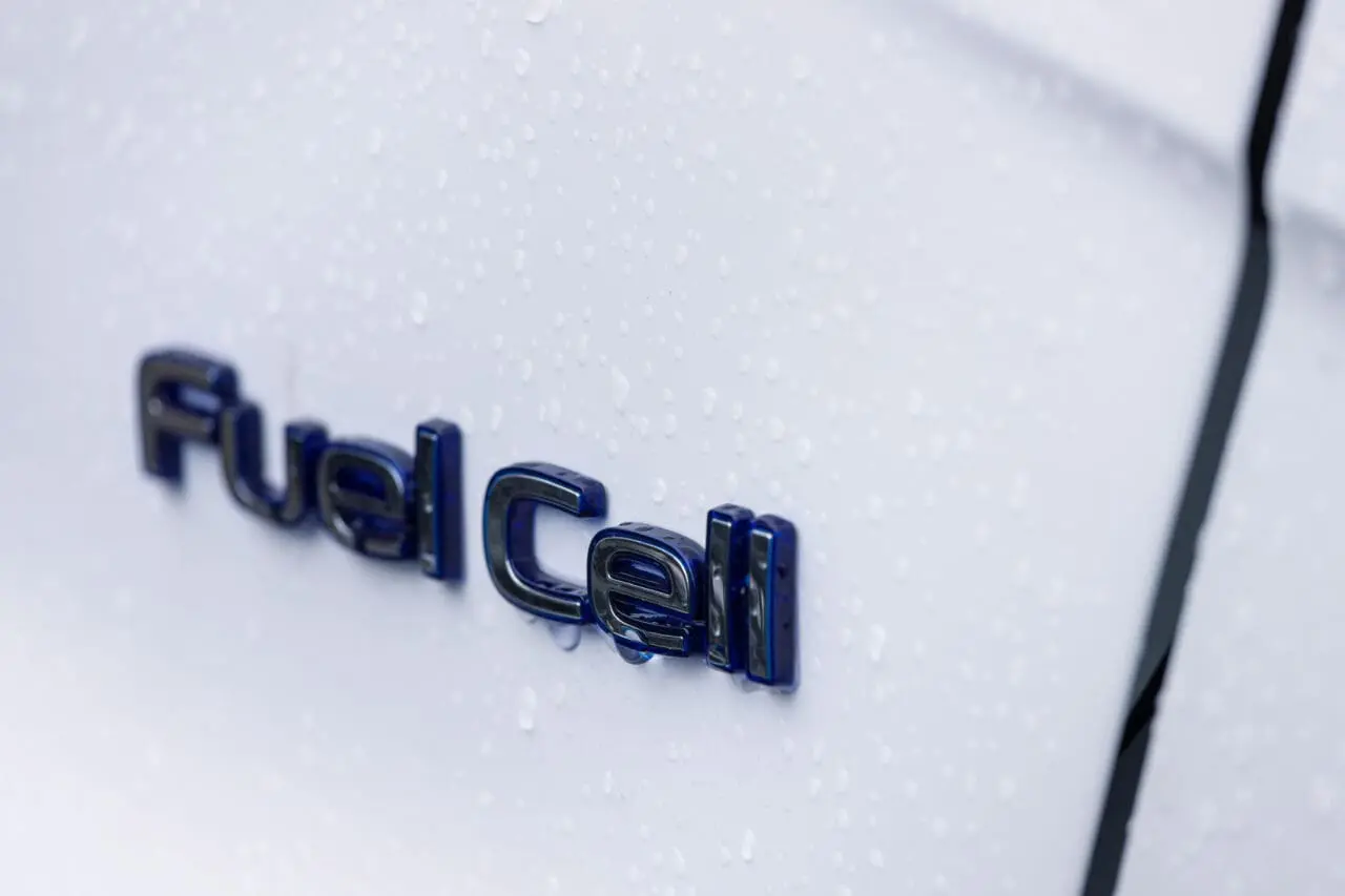 a modern car with a fuel cell sign