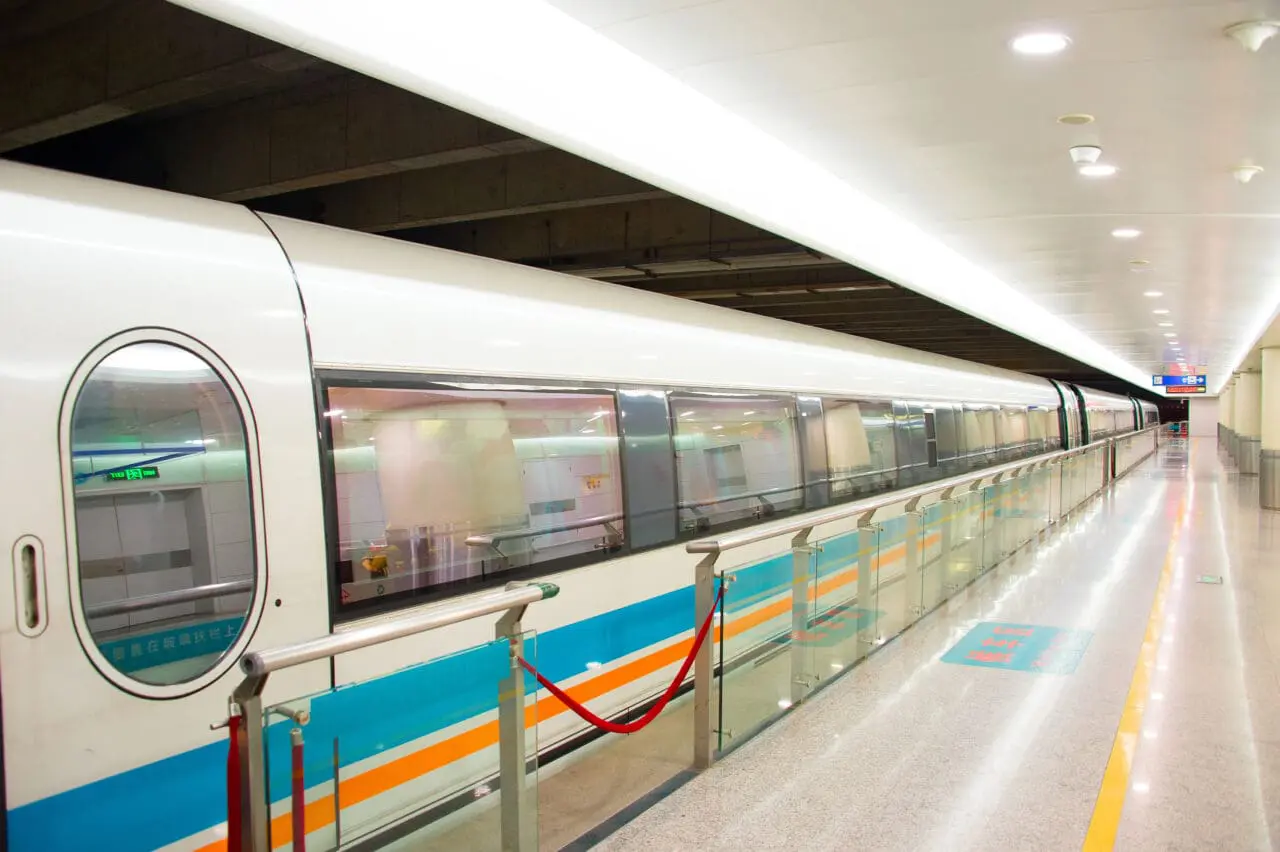 Bright modern train at an empty train station