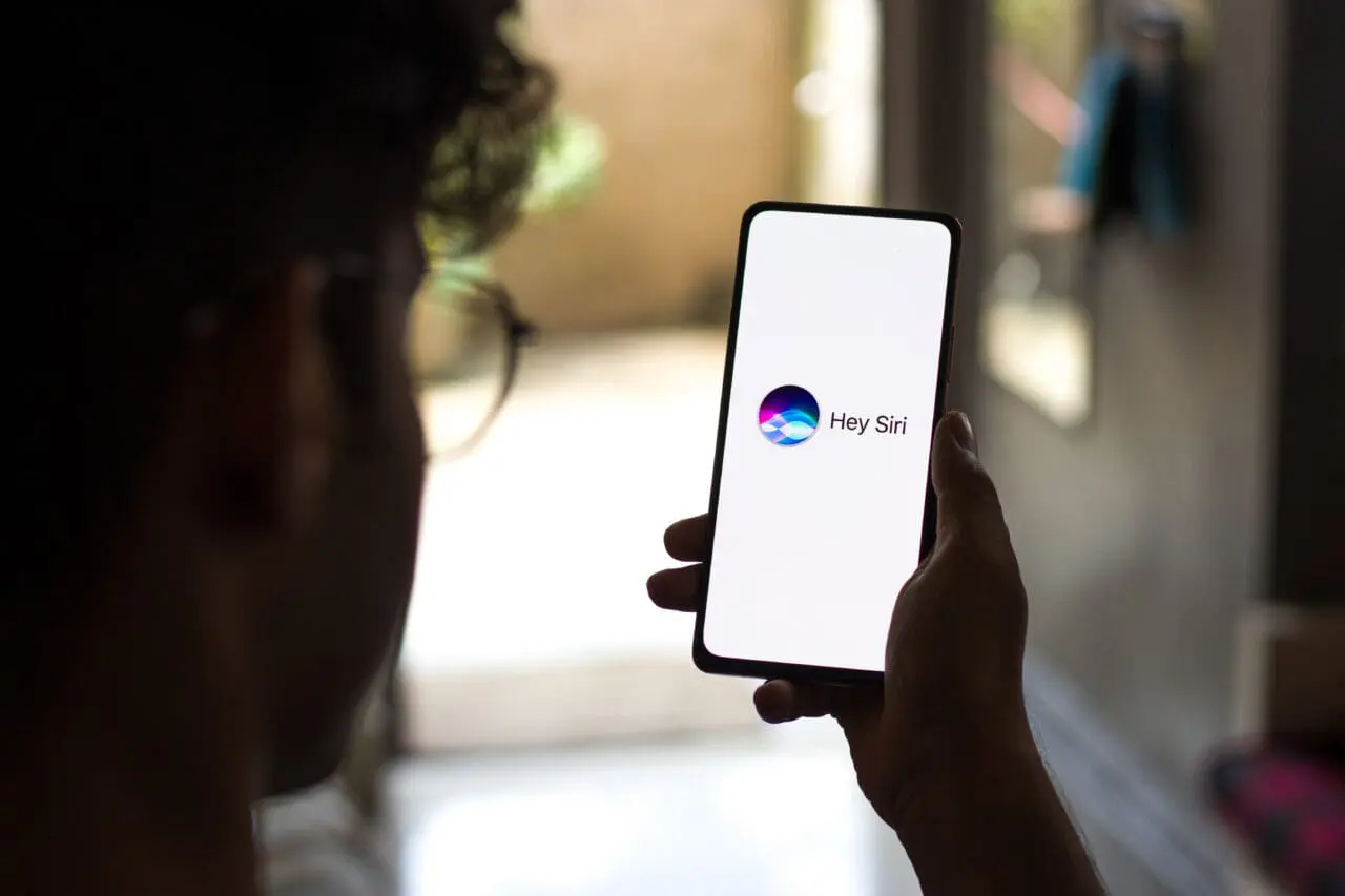 Siri logo on phone screen stock image.