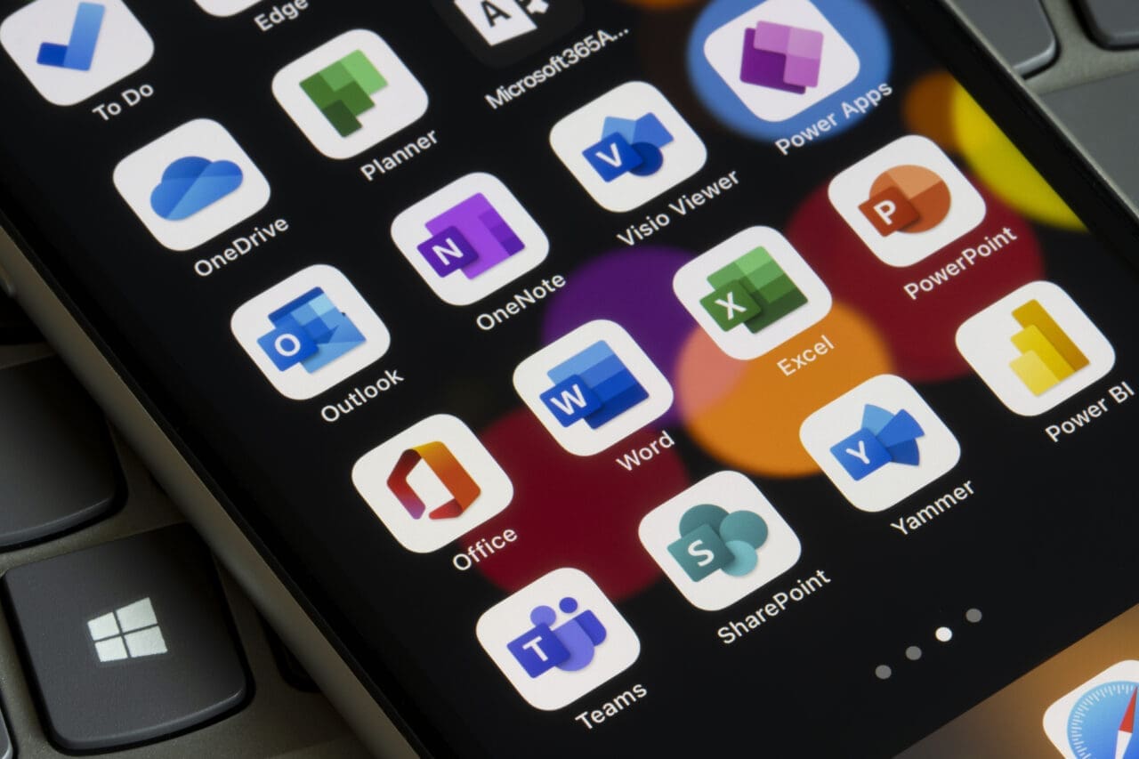 Microsoft 365 apps on a home screen of an iPhone