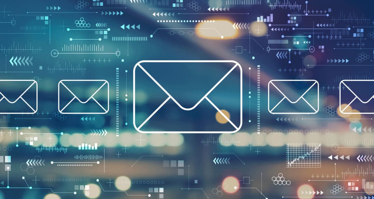 Email concept with blurred city lights in background