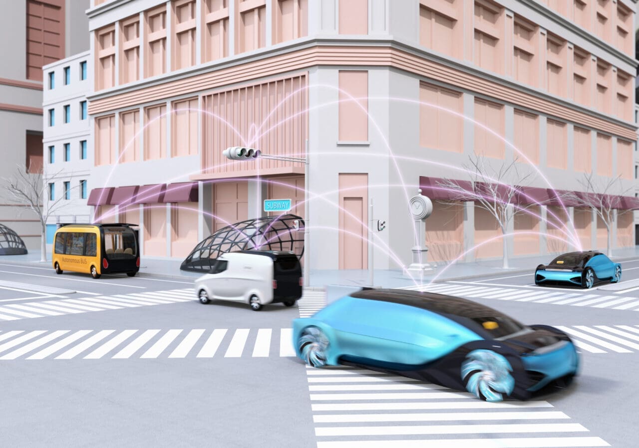 Traffic in modern city intersection. Self driving sedan