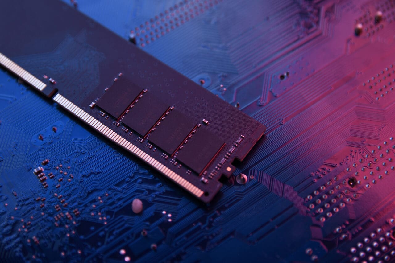 Computer memory RAM on motherboard background .