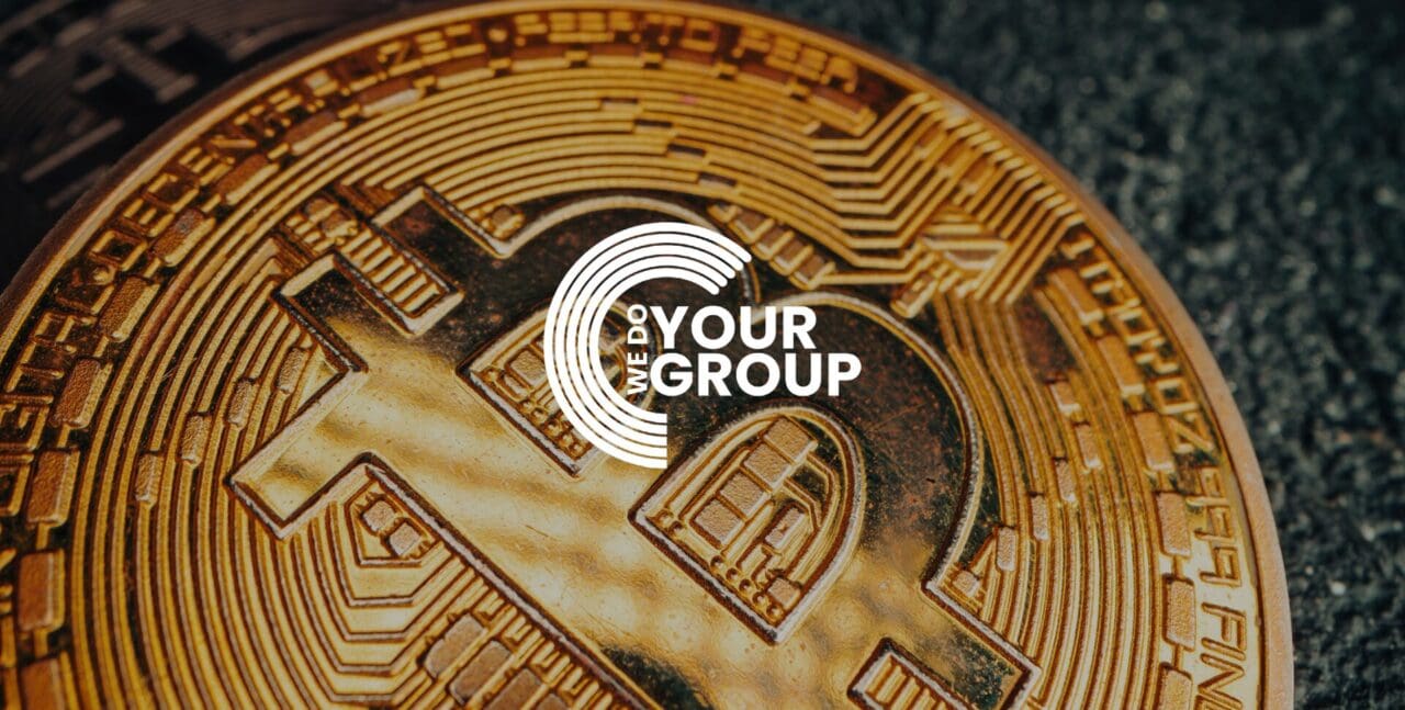 WeDoYourGroup white logo on background with Bitcoin