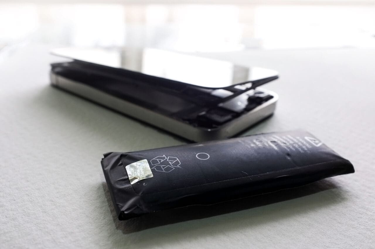 Swollen mobile phone battery. Expired or low quality Phone Batte