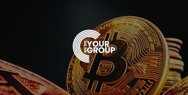 WeDoYourGroup white logo on background of Gold Bitcoins