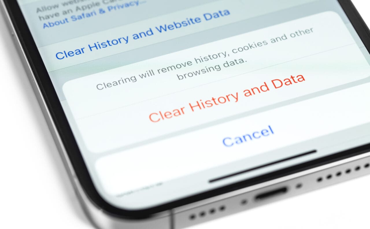 Apple iPhone screen showing message to clear history and data