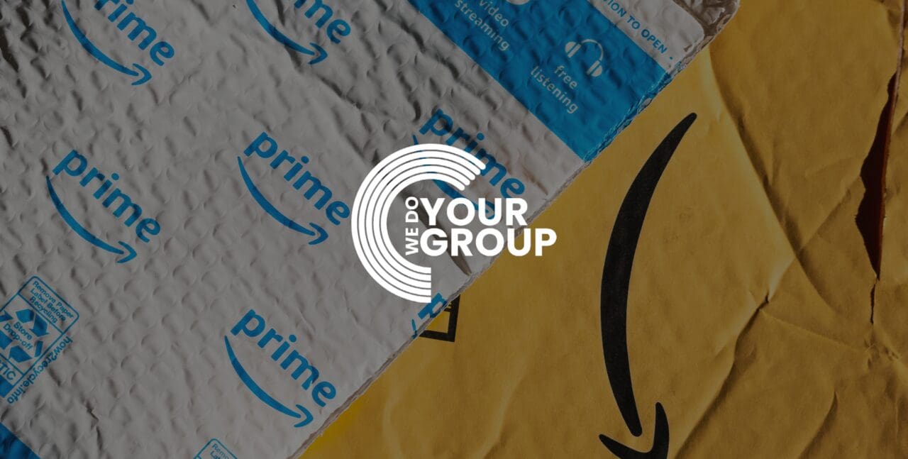 WeDoYourGroup white logo on background of an Amazon Prime box