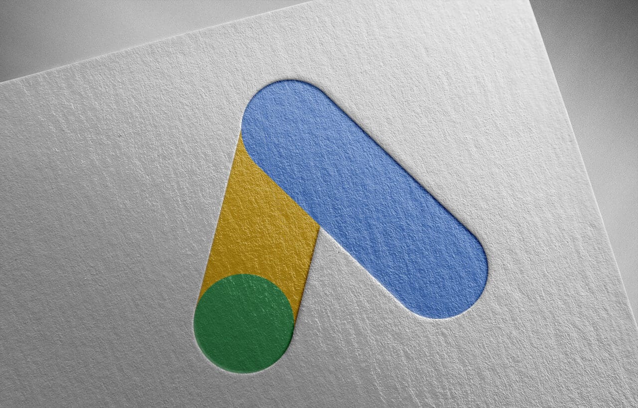 Google Ads logo on paper texture
