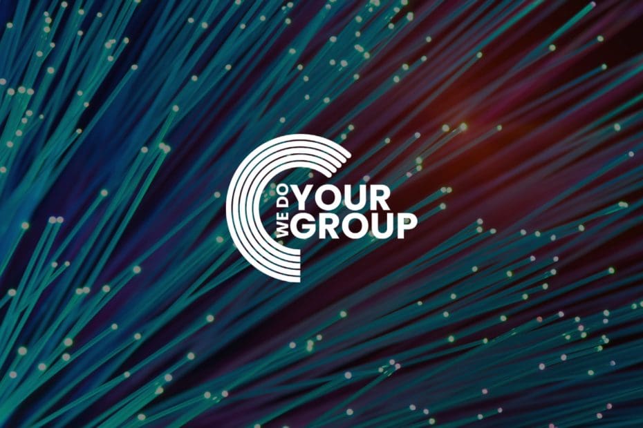 WeDoYourGroup white logo on background with small lights