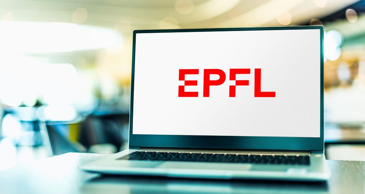 Laptop computer displaying logo of EPFL