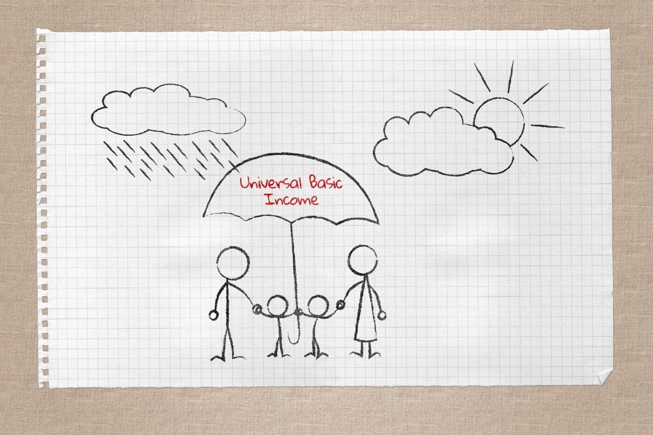 Drawing on note pad of family under the protective umbrella of u