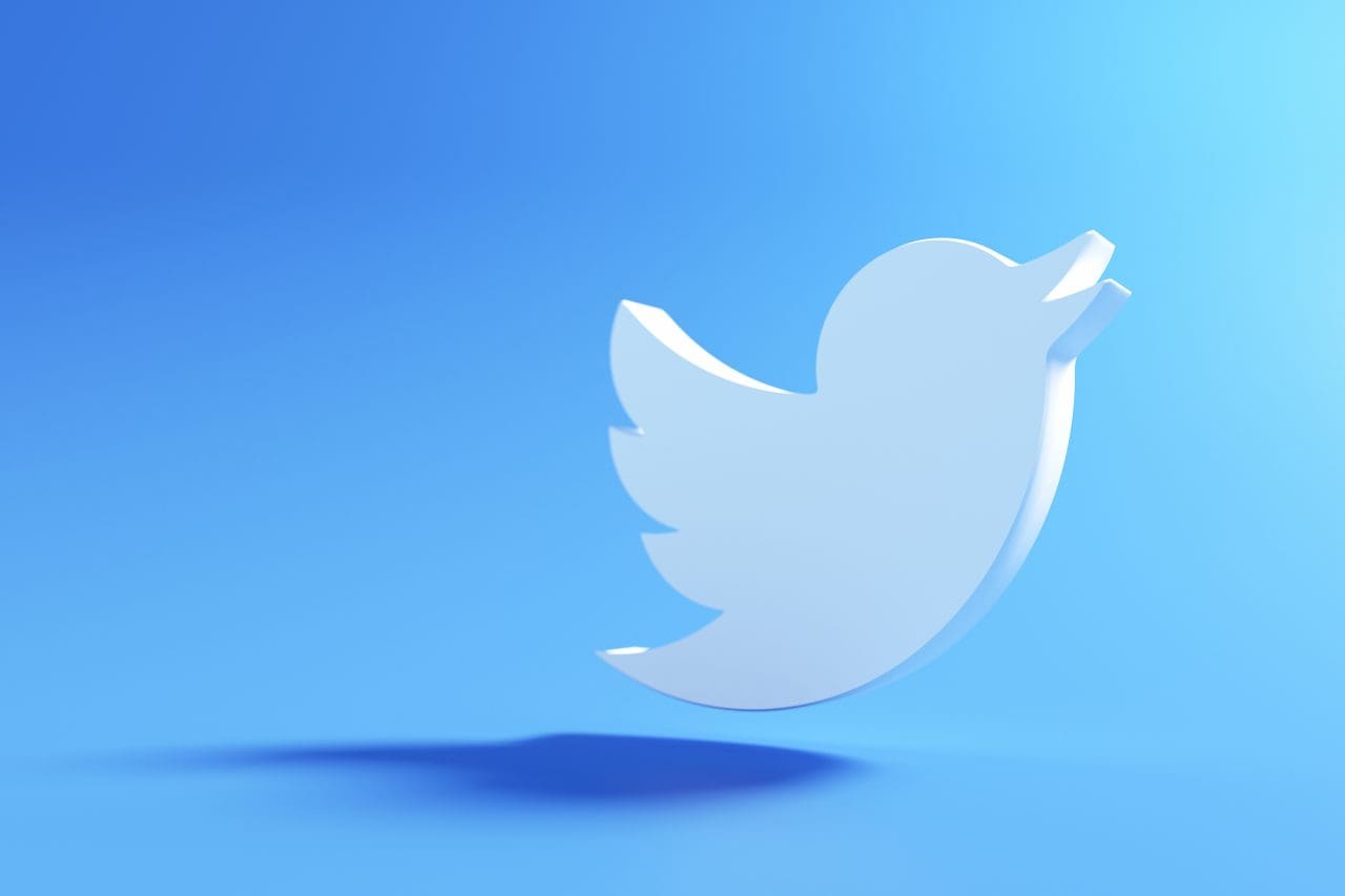 3D twitter logo on blue background, social media application. 3d