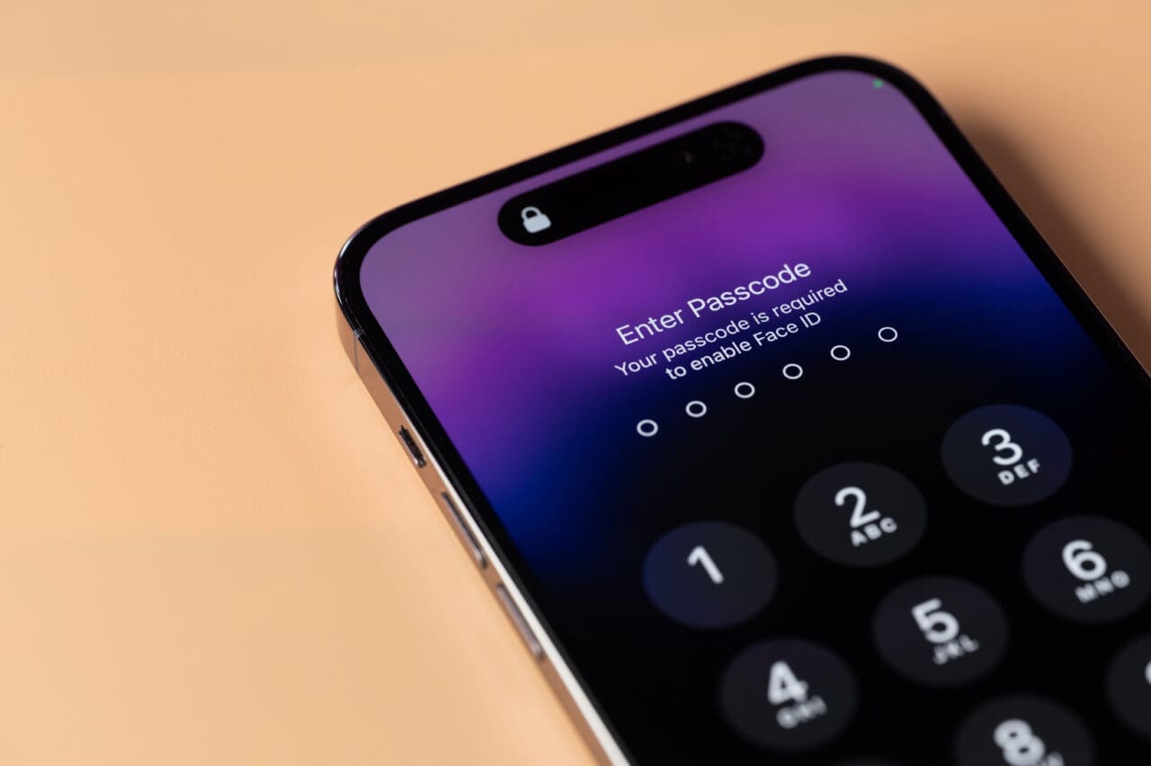 Face id lock on Iphone 14 pro in smartphone screen close up view