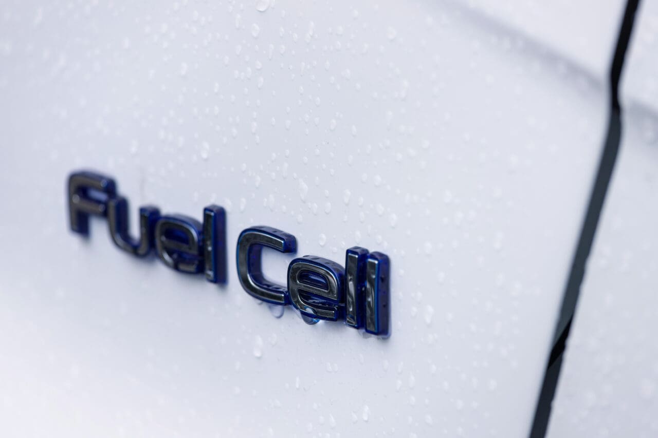 a modern car with a fuel cell sign