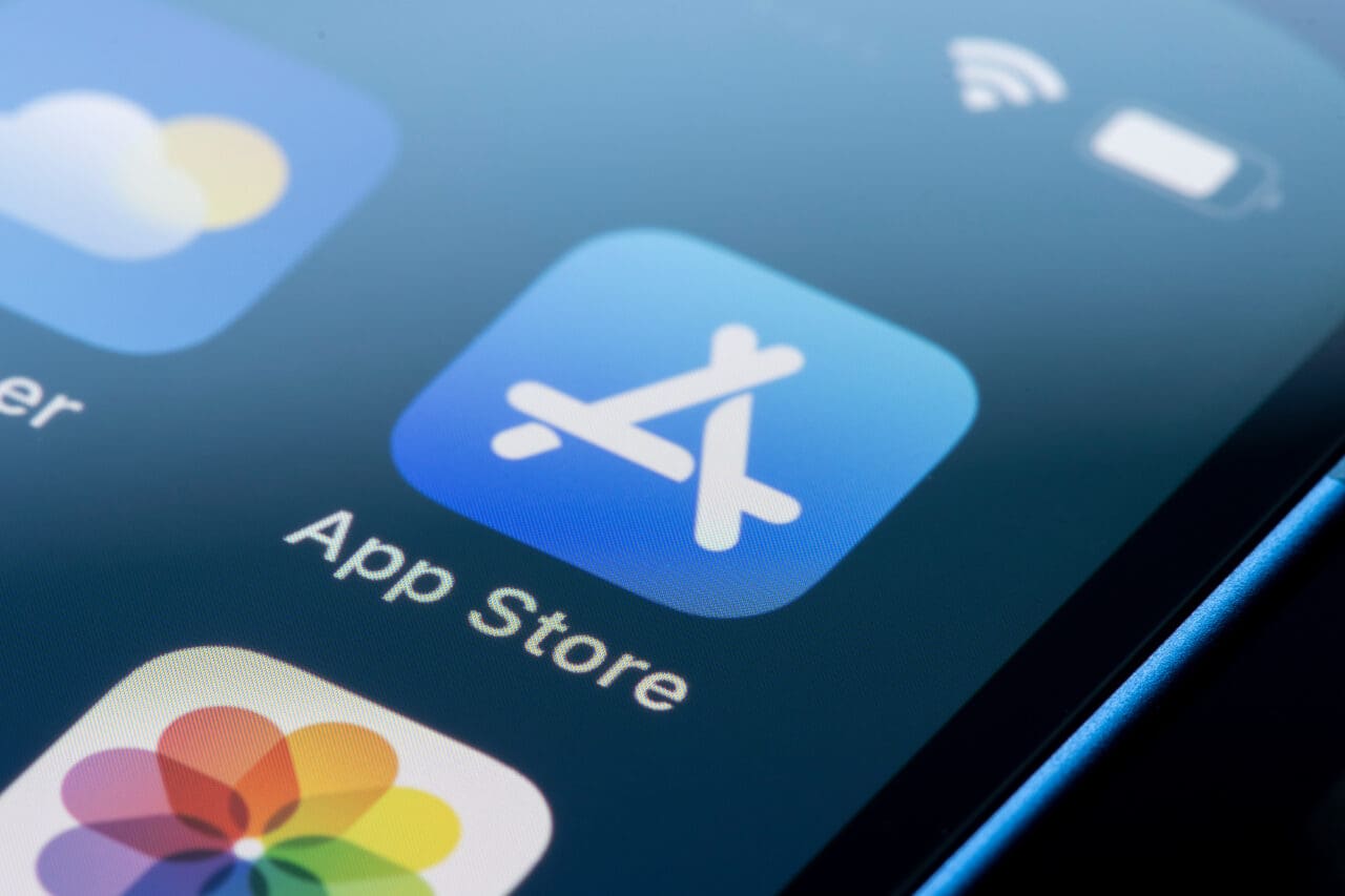 Closeup of the App Store icon seen on an iPhone. The App Store platform is developed and maintained by Apple Inc. for mobile apps on its operating systems.