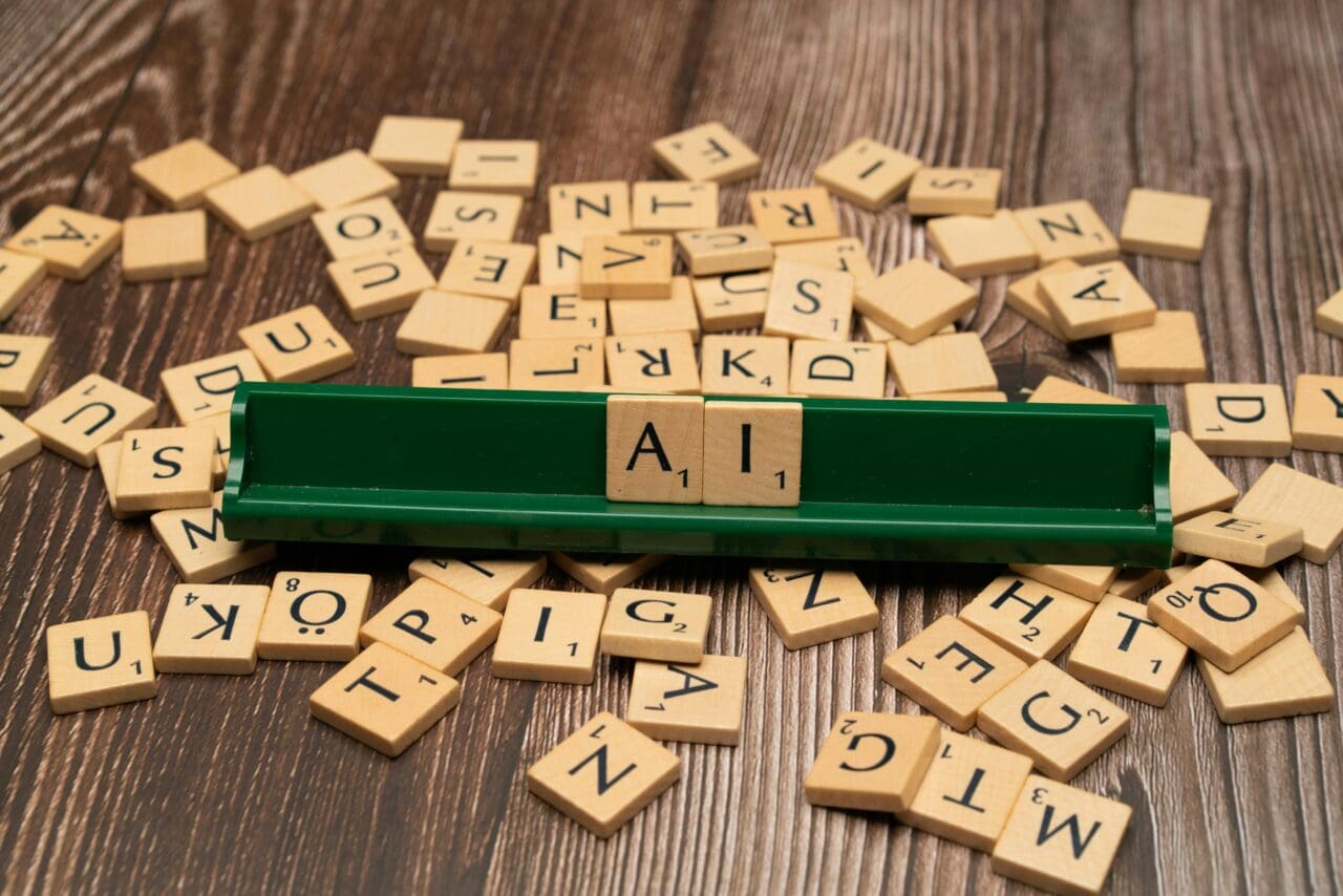 word AI written with scrabble letters