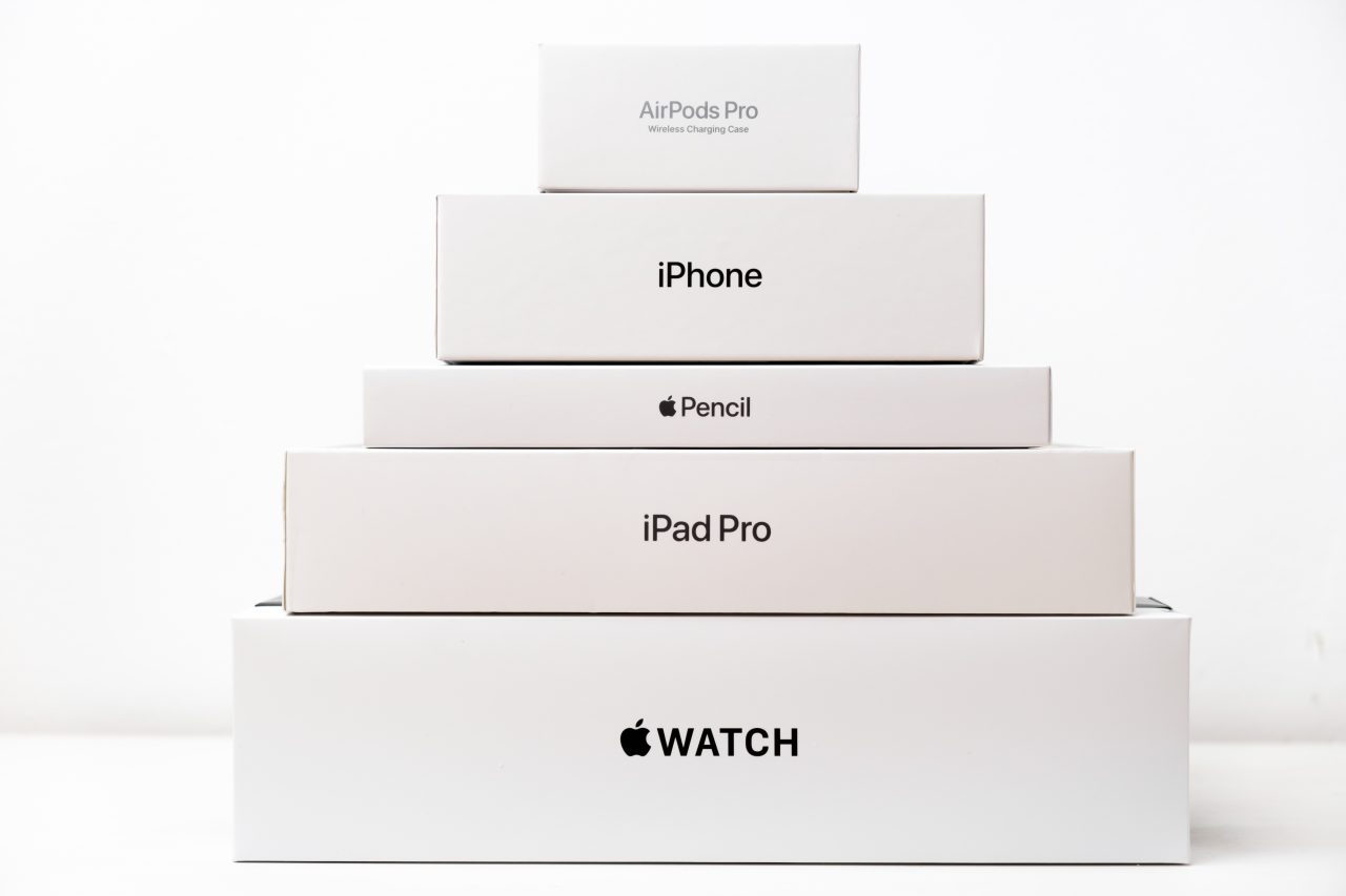 Apple watch, iPad Pro, Apple pencil, iphone, airpods pro pyramid from boxes. Shopping concept.